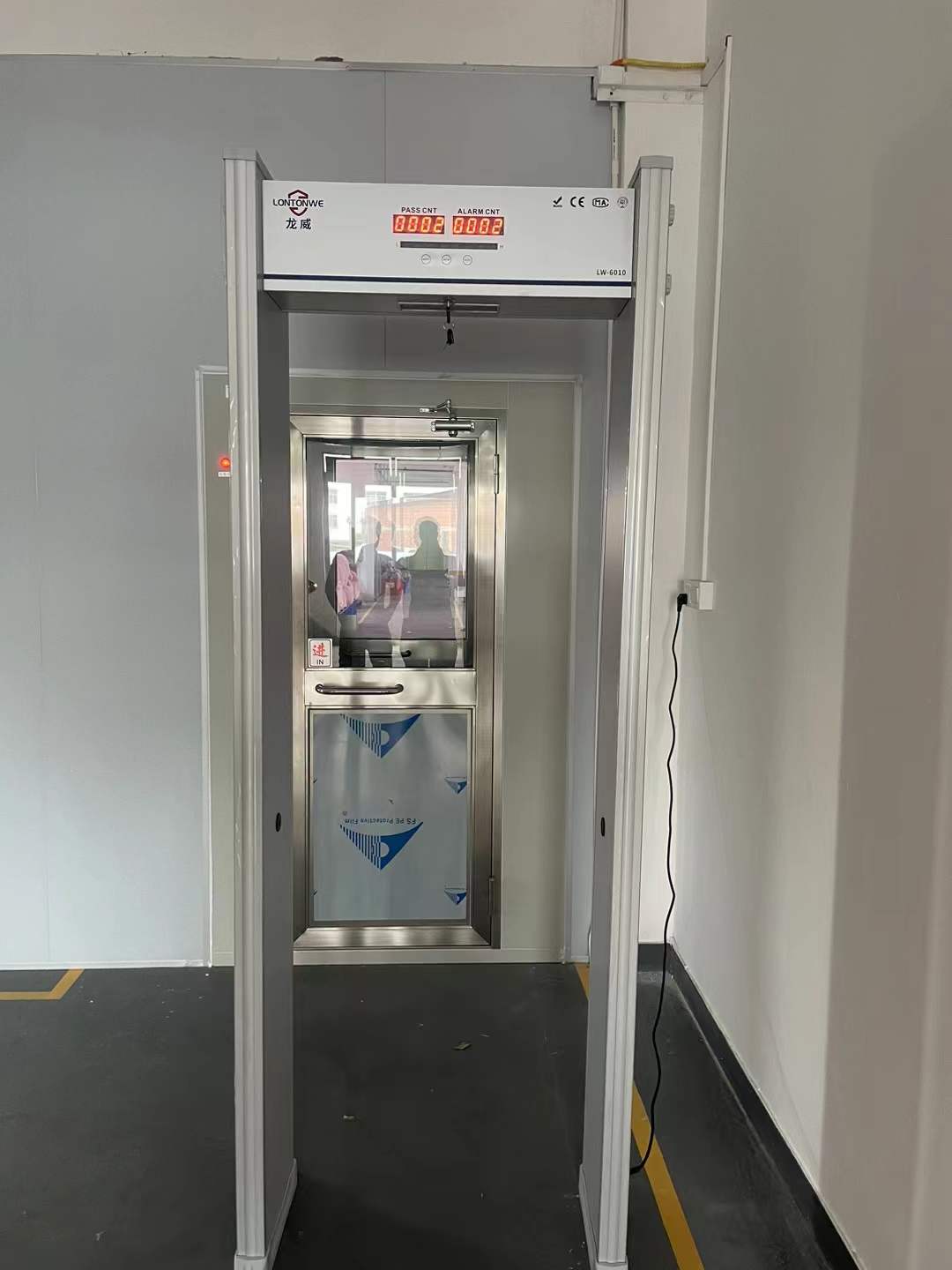 2024年3月 出口玩具厂 生产车间使用“龙威”安检门和安检机